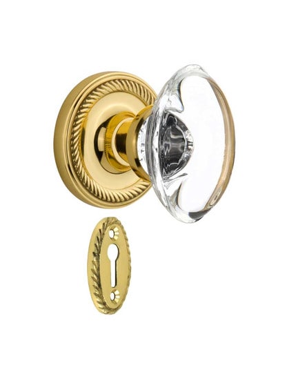 Rope Rosette Mortise-Lock Set with Oval Crystal Glass Knobs in Polished Brass.